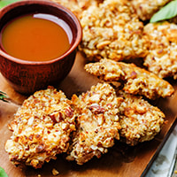 photo of almond-crusted pork with dipping sauce