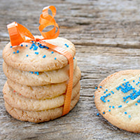 photo of sample Holiday Sugar Cookies that have been decorated with blue sprinkles